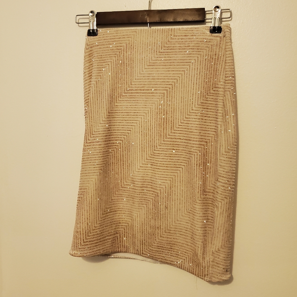 Gorgeous skirt with gold glitter- free gold clutch